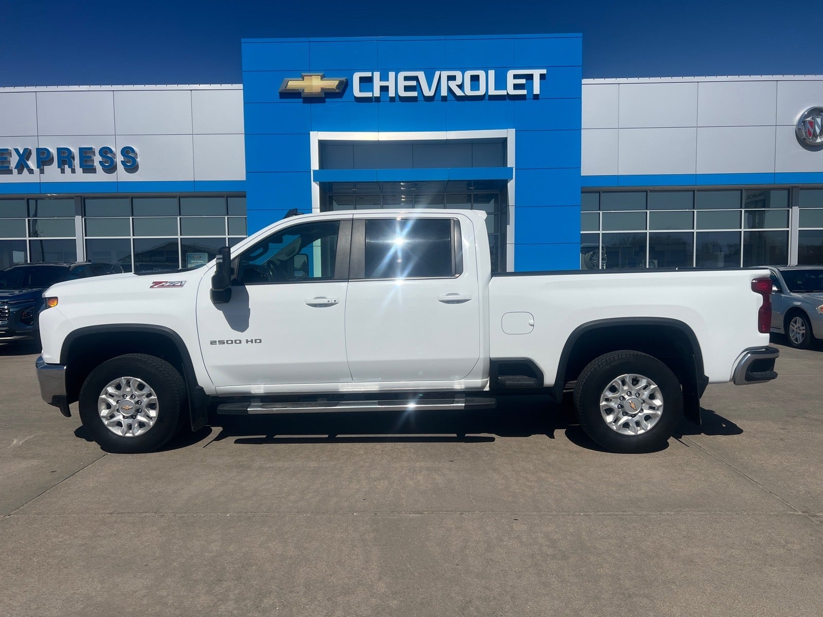 2022 Chevrolet Silverado 2500 HD LT in Summit White — front three-quarter view
