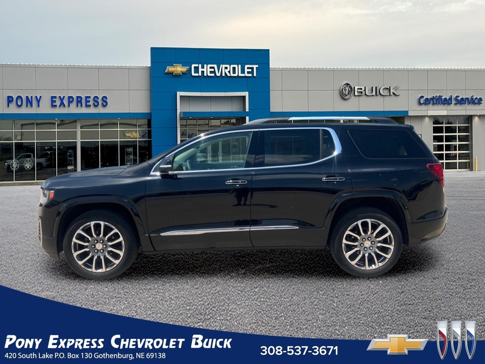 2023 GMC Acadia Denali in Ebony Twilight Metallic — front three-quarter view