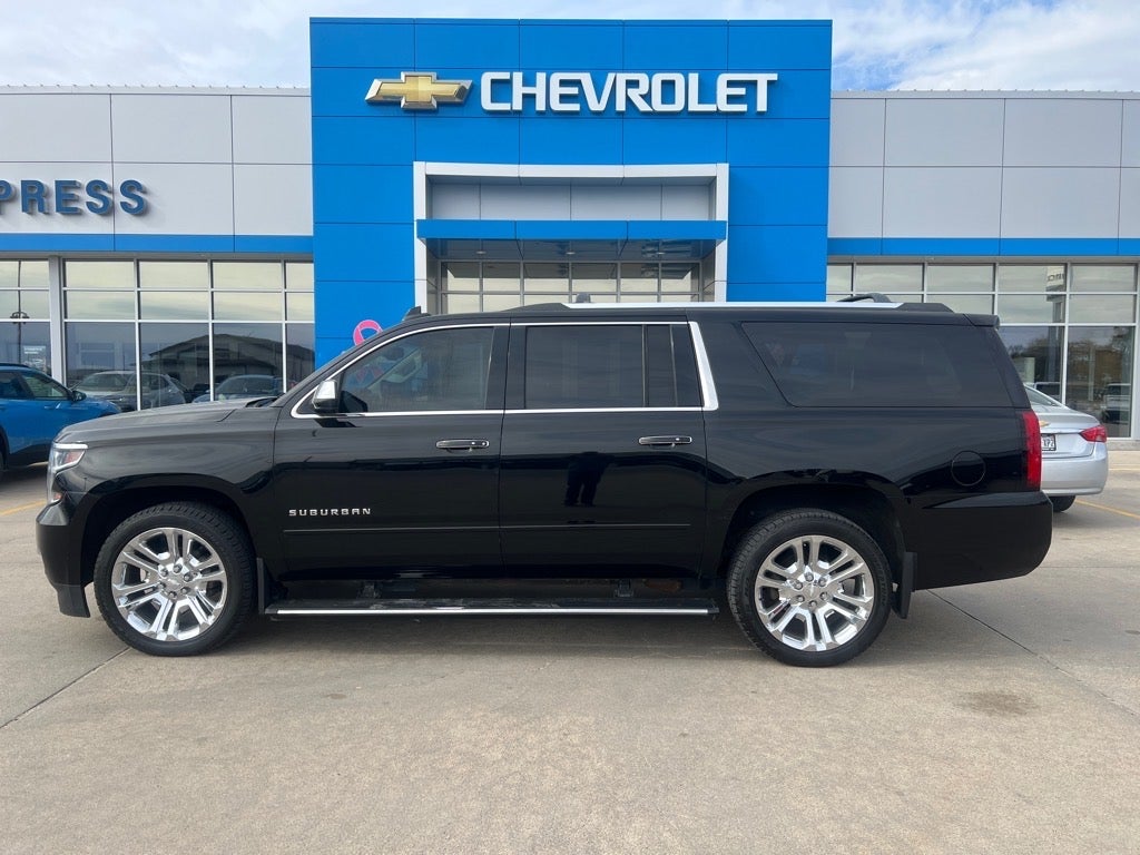 2017 Chevrolet Suburban Premier in Black — front three-quarter view