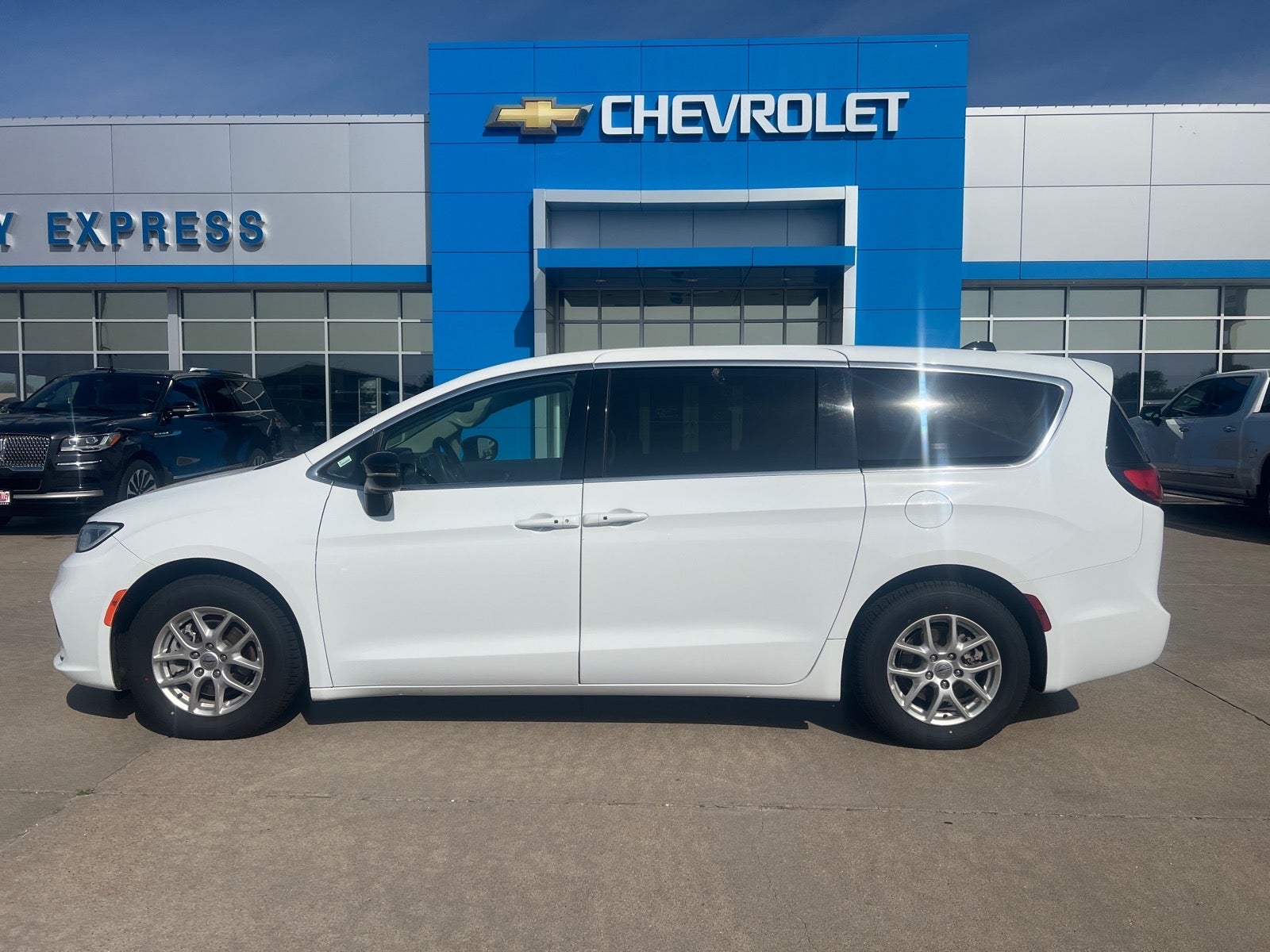 2024 Chrysler Pacifica Touring L in White — front three-quarter view