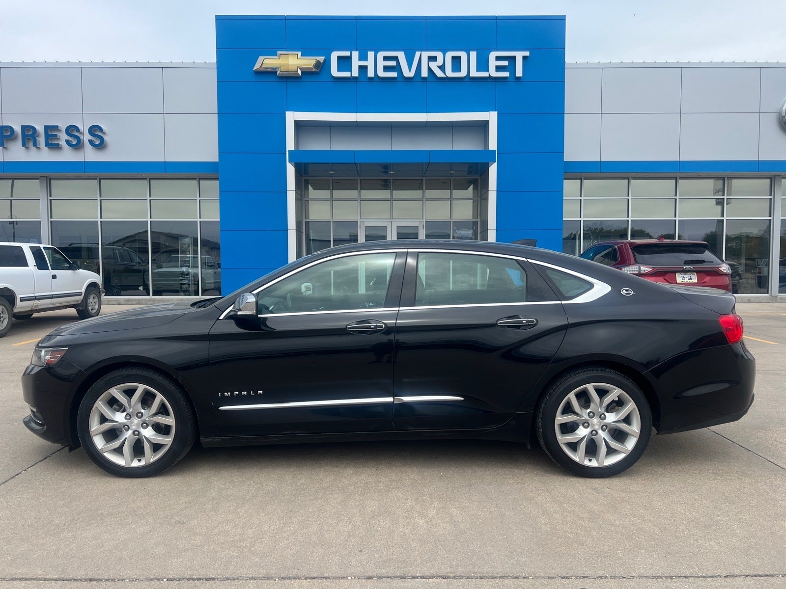 2016 Chevrolet Impala LTZ in Mosaic Black Metallic — front three-quarter view