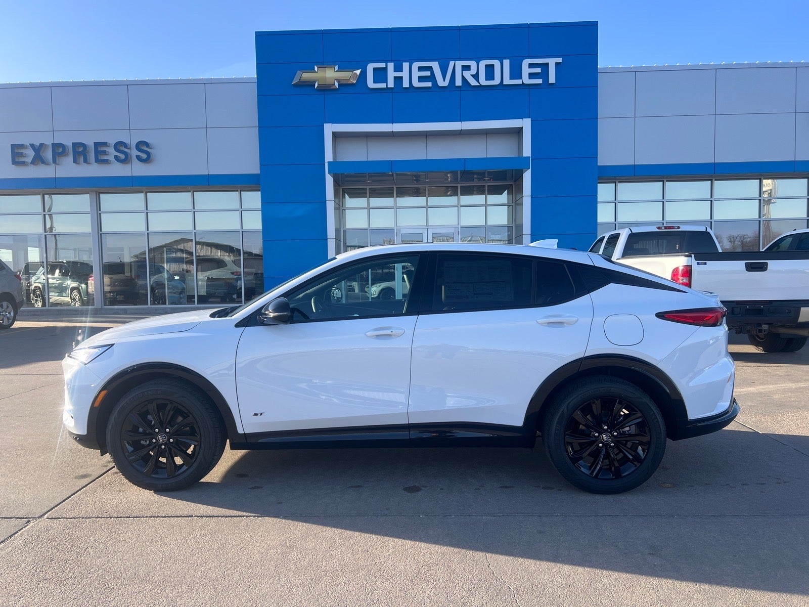2026 Buick Envista Sport Touring in Summit White — front three-quarter view